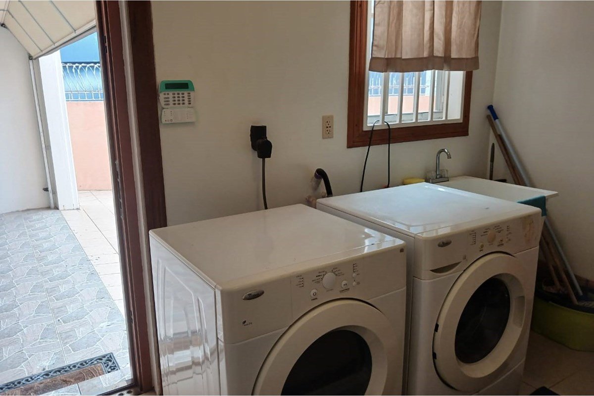 Furnished four-bedroom home for rent – Lamaha Gardens (US$4,000/month) – Adler Bynoe