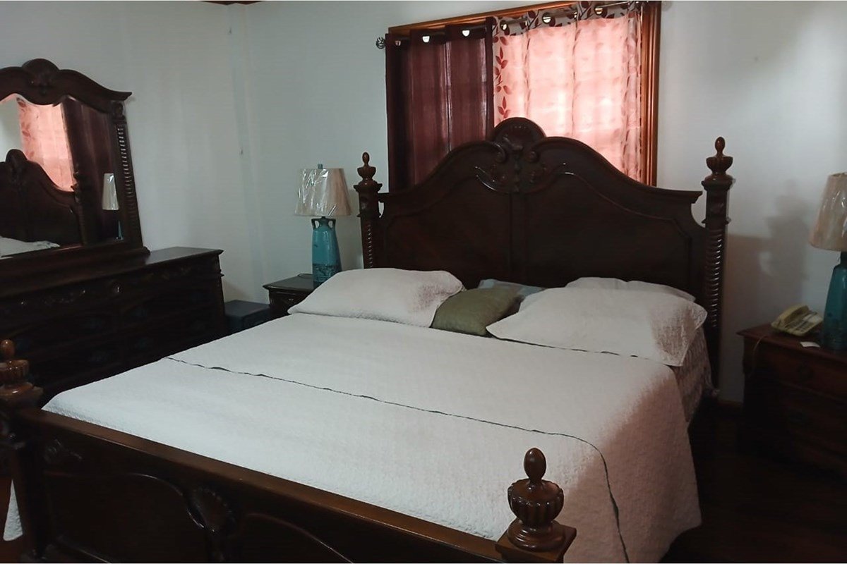 Furnished four-bedroom home for rent – Lamaha Gardens (US$4,000/month) – Adler Bynoe