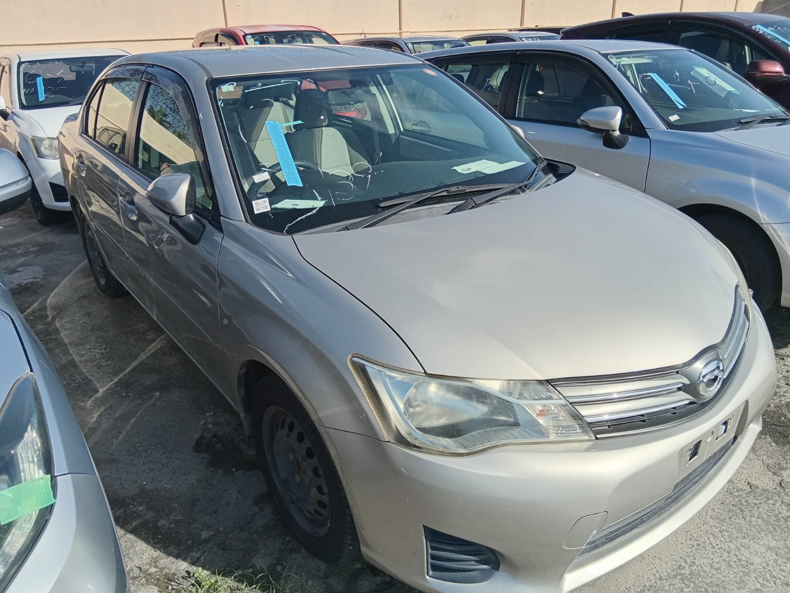 2013 Toyota Axio for Sale in Guyana – Gold/ Silver – Ref 13063