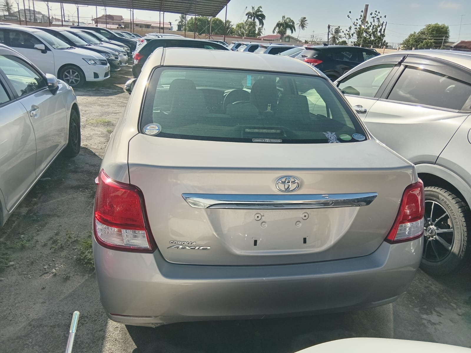 2013 Toyota Axio for Sale in Guyana – Gold/ Silver – Ref 13063